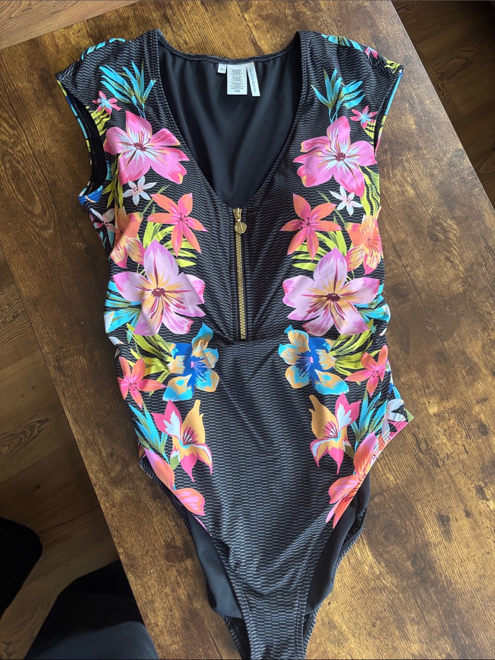 Bleu Rod Beattie Black One-Piece Swimsuit with Bright Floral Print and Front Zip